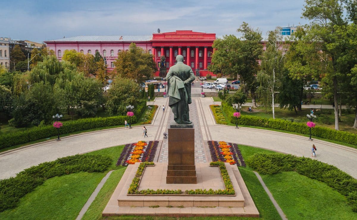 Monument to Taras Shevchenko and the red building of the university in Kyiv