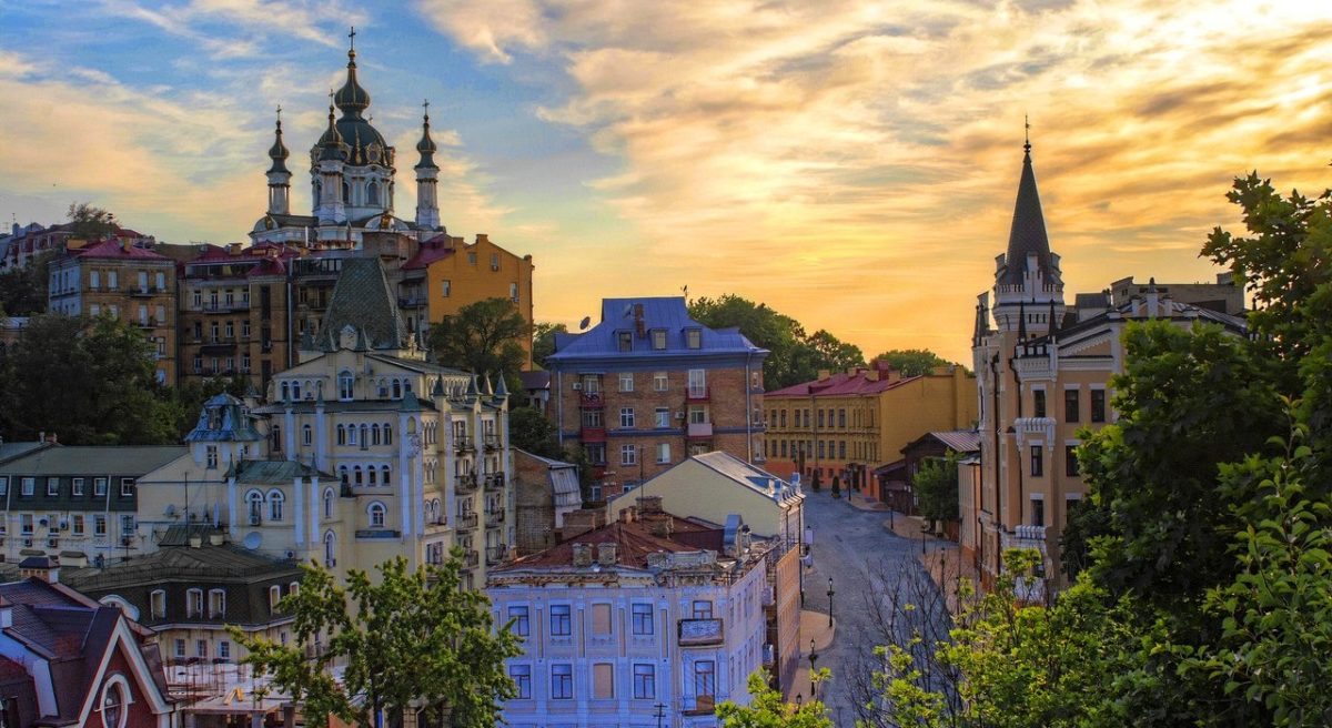 Andriyivskyy Descent in Kyiv - historic cobblestone street with colorful buildings, art galleries, and local shops.