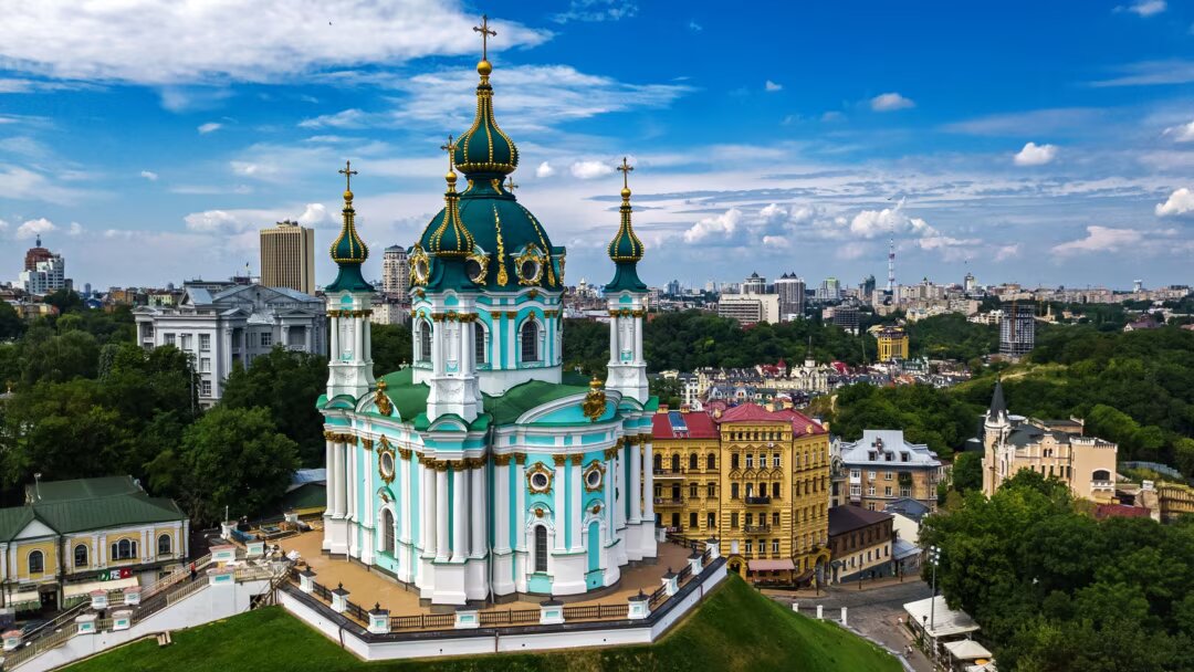 St. Andrew's Church in Kyiv - Baroque-style landmark with colorful domes, elegant architecture, and panoramic city views.
