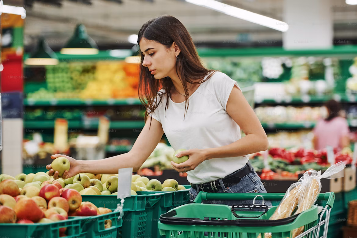 Buying vegetables and fruits at the market and fair