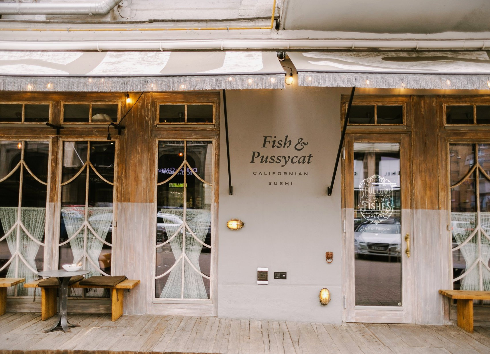 Fish Pussycat sushi bar photos - restaurant facade featuring large windows and clear exterior branding