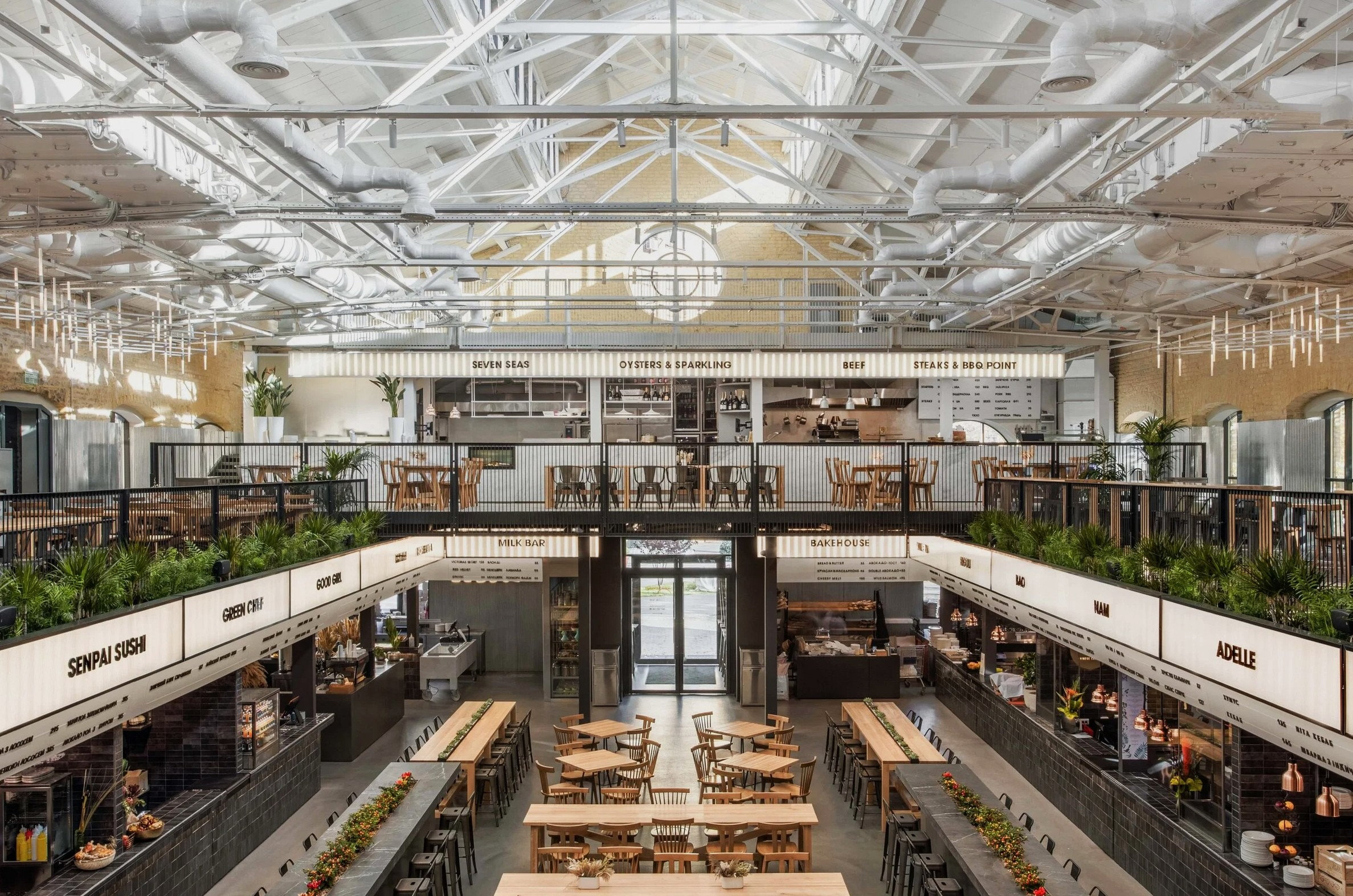 Kyiv Food Market main hall with wooden tables