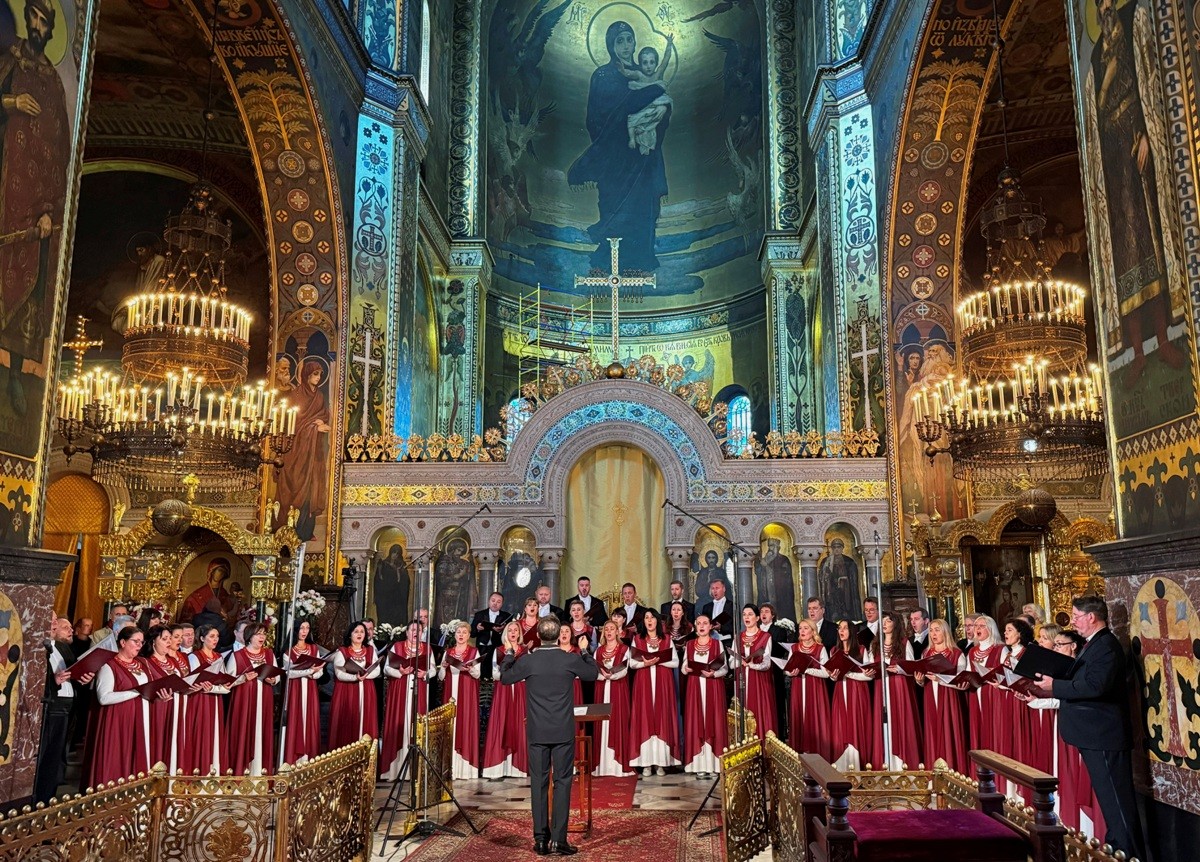 St. Volodymyr's Cathedral in Kyiv - choir in red robes performing in front of altar