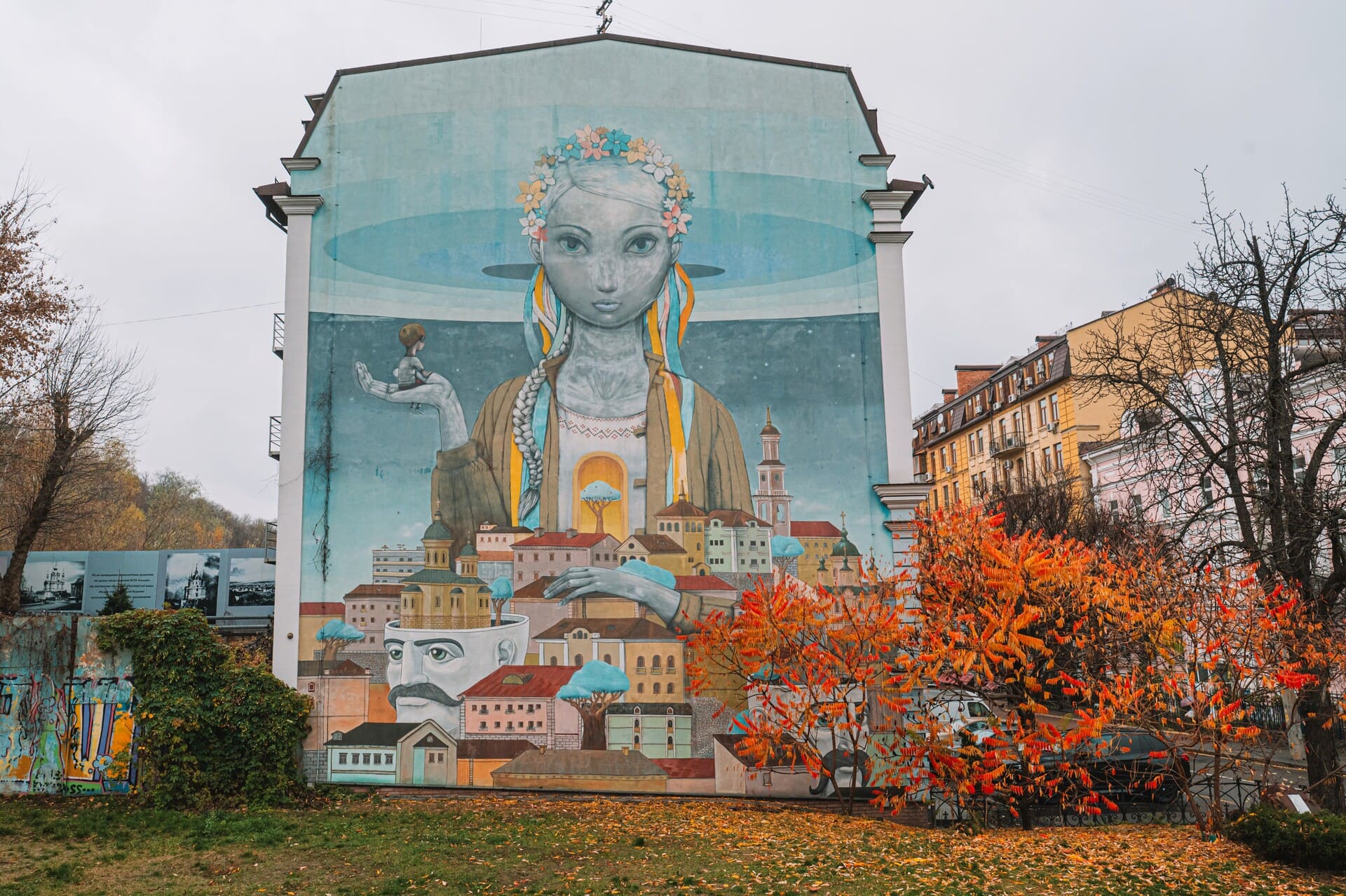 Renaissance mural - a girl with a wreath above Kyiv
