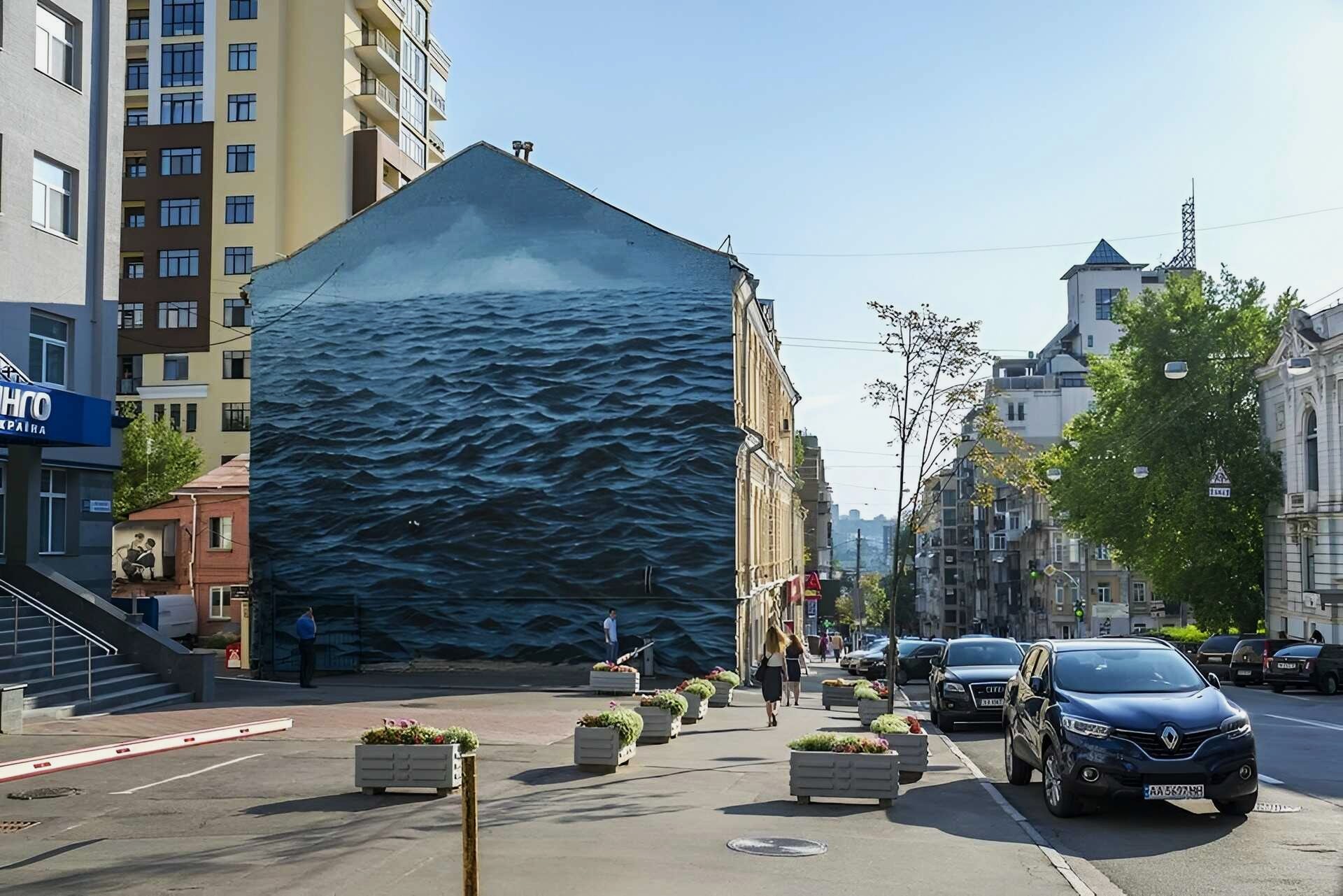 Large blue mural of the Black Sea on a building in Kyiv