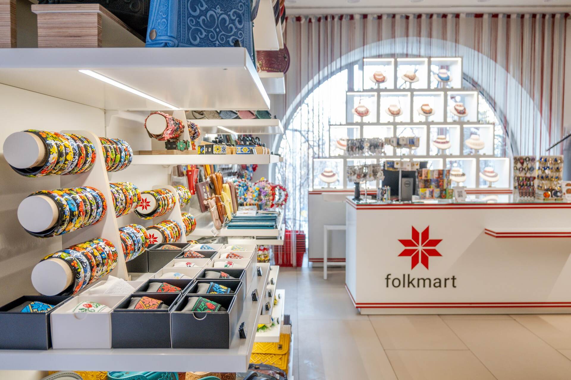 Folkmart checkout counter with traditional jewelry and souvenirs in Kyiv
