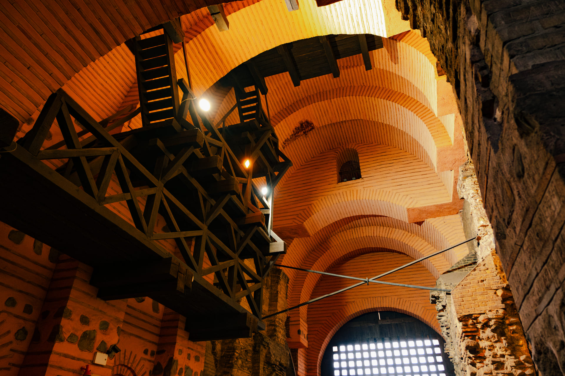 Golden Gate in Kyiv - interior wooden beams and brick arches