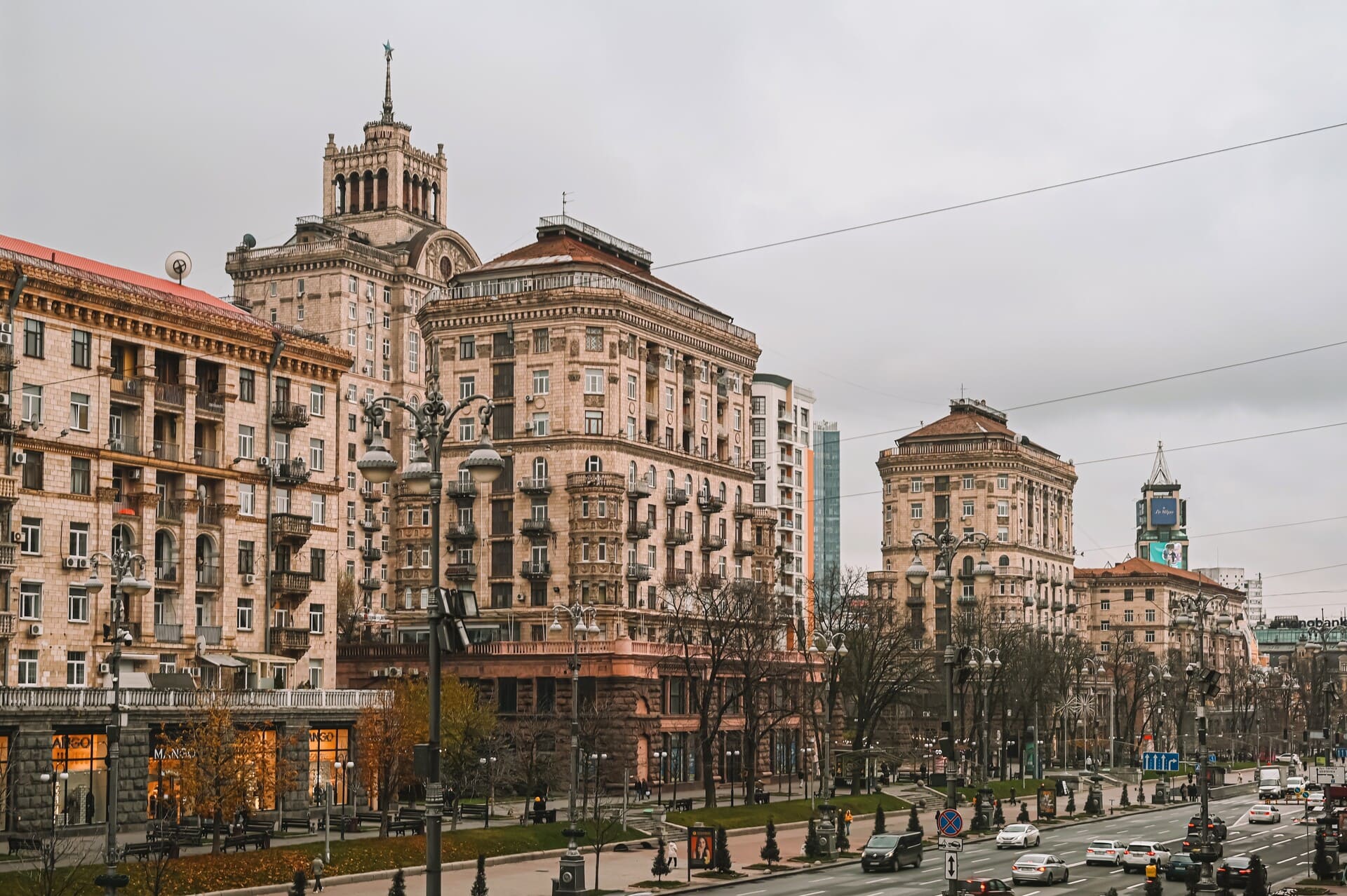 Khreshchatyk in Kyiv - historic brick skycraper on Khreshchatyk with a tall spire