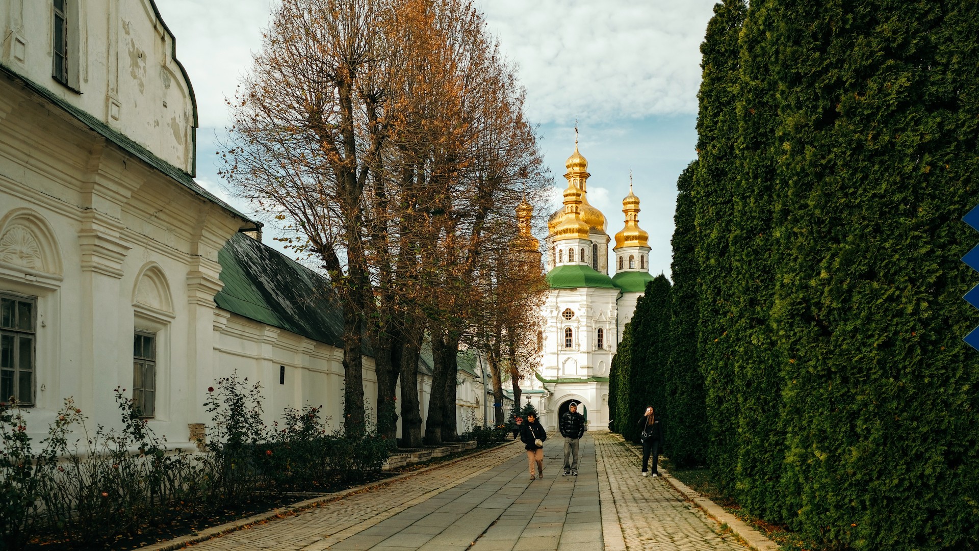 Kyiv Pechersk Lavra - autumn garden and view of the facade of the Dormition Cathedral