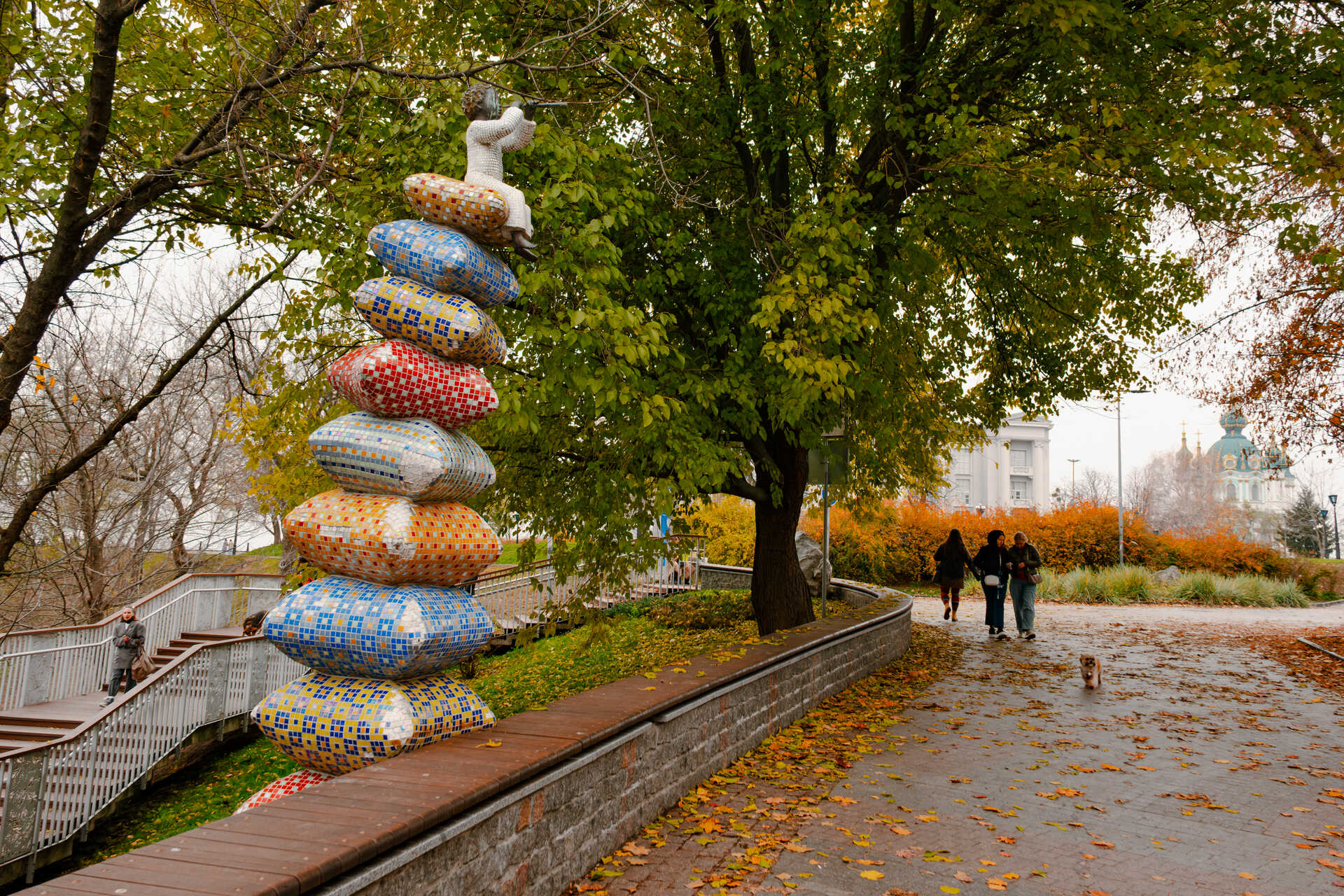 Landscape Alley - view of the alley and a statue sitting on many cushions