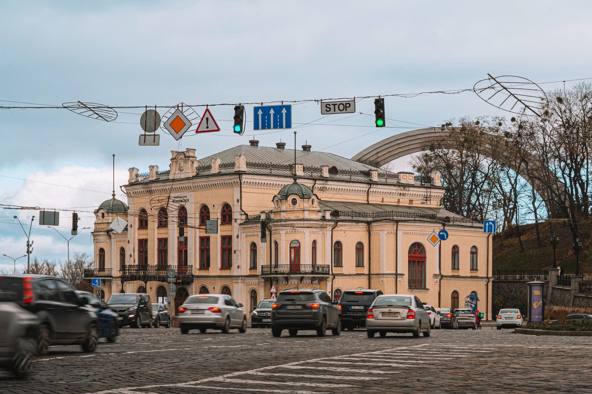 Glass bridge in Kyiv - view at the yellow National Philharmonic building
