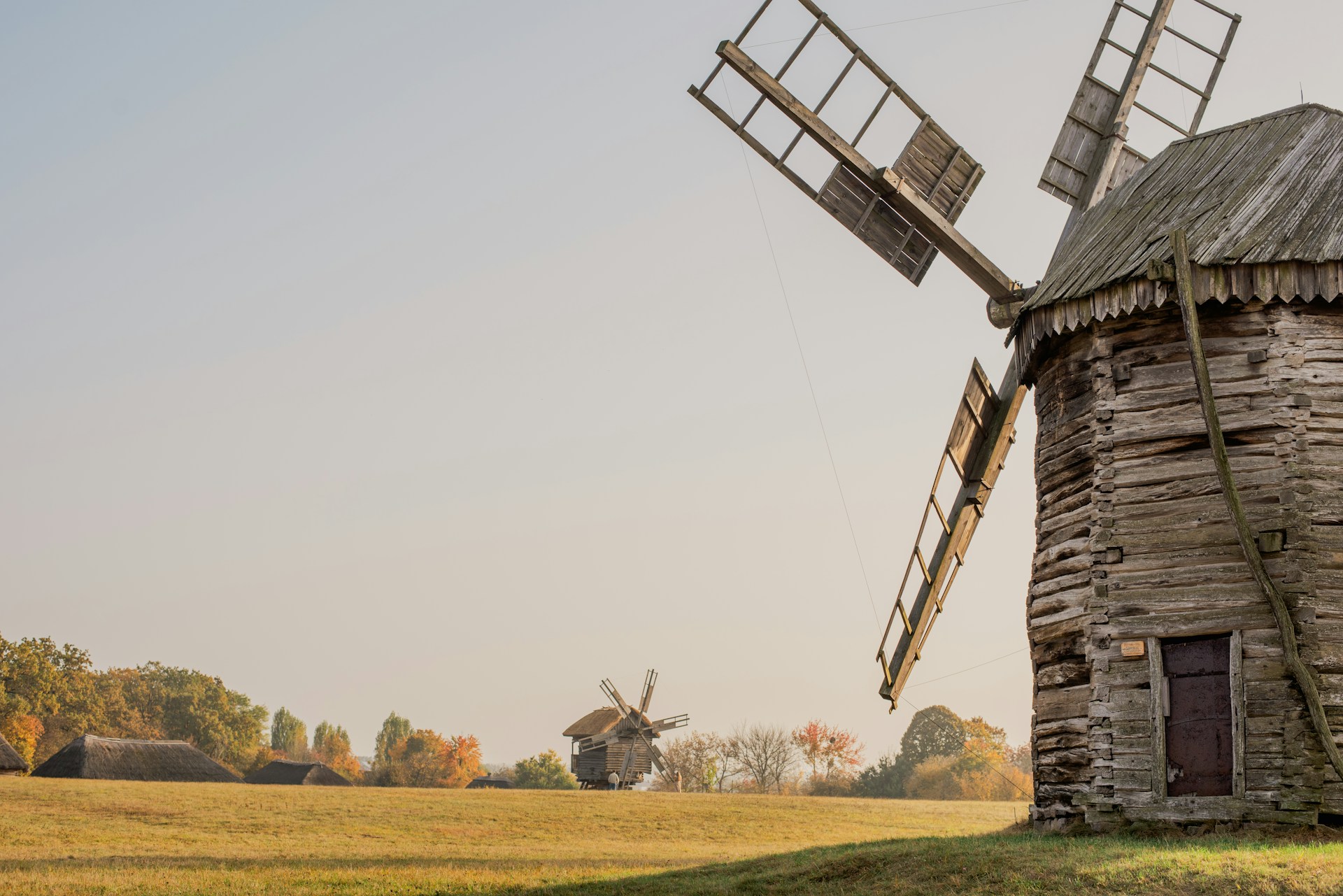 Pyrohiv Museum in Kyiv - historic wooden windmill in open field