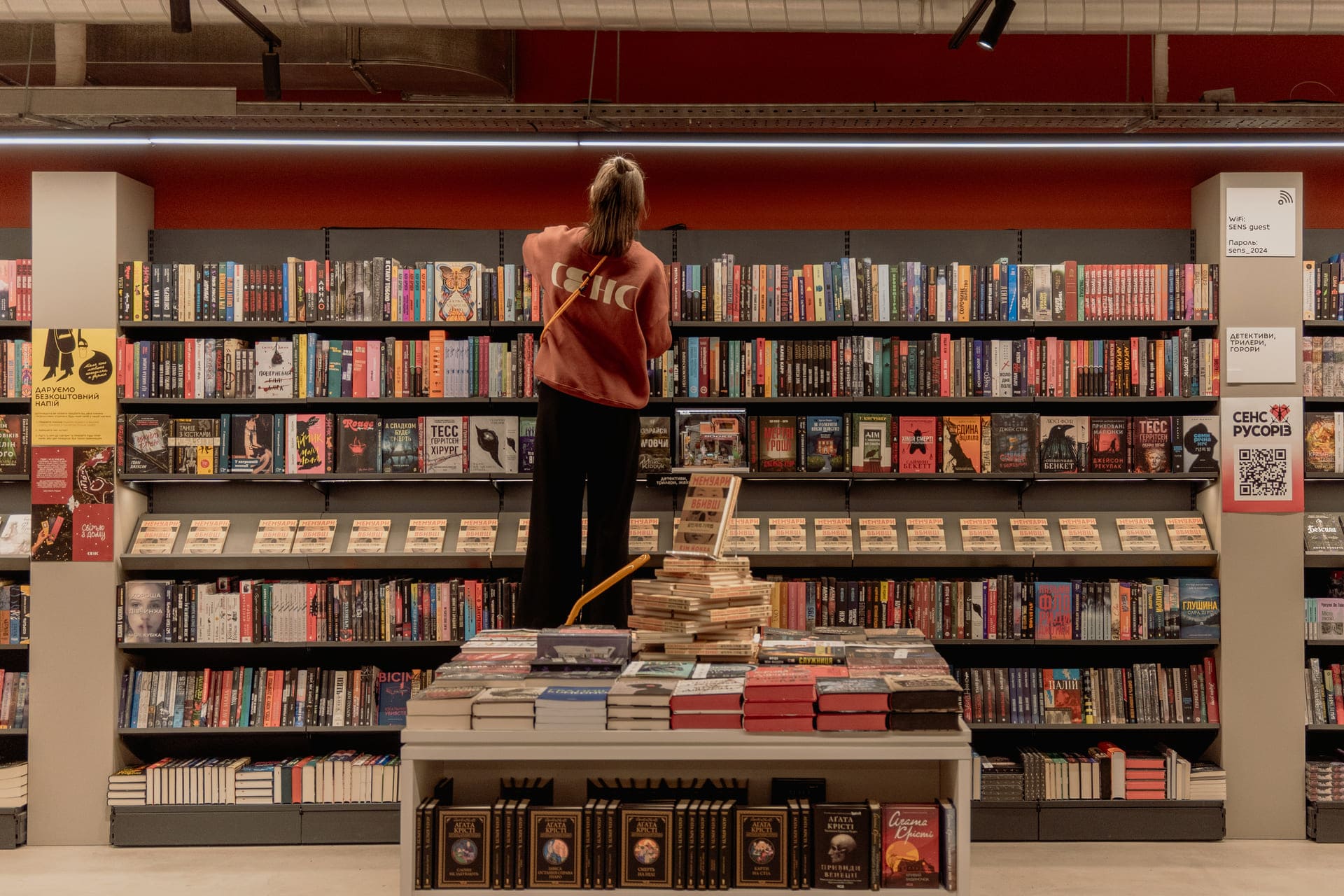 High bookshelf wall in the retail room at Sens bookstore in Kyiv