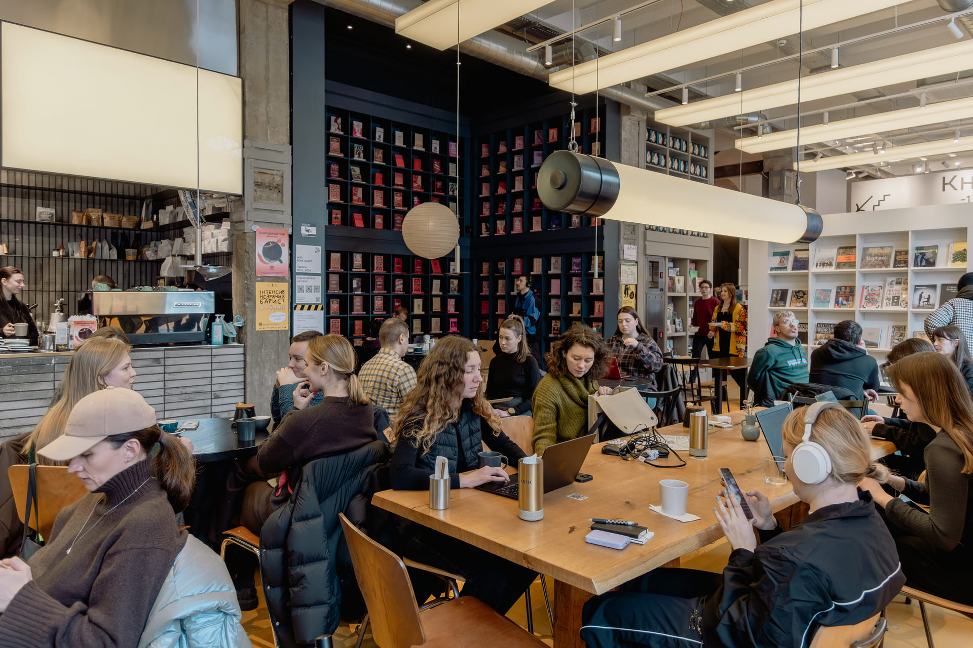 Shared workspace and cafe hall with customers at Sens bookstore in Kyiv
