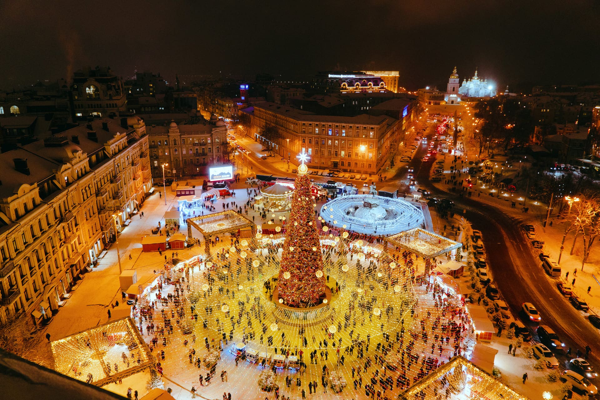 Sofiiska Square Christmas market and festive lights in Kyiv, view from Saint Sophia Cathedral bell tower