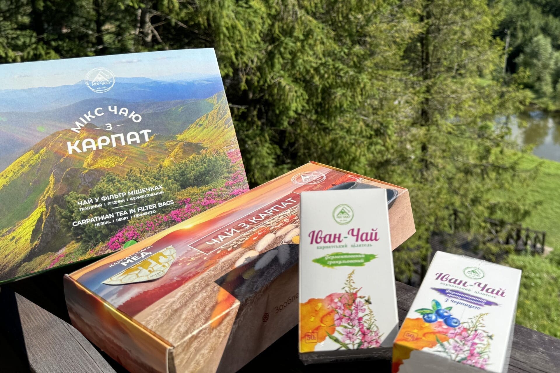 Carpathian herbal tea and Ivan Chai boxes displayed outdoors in Ukraine