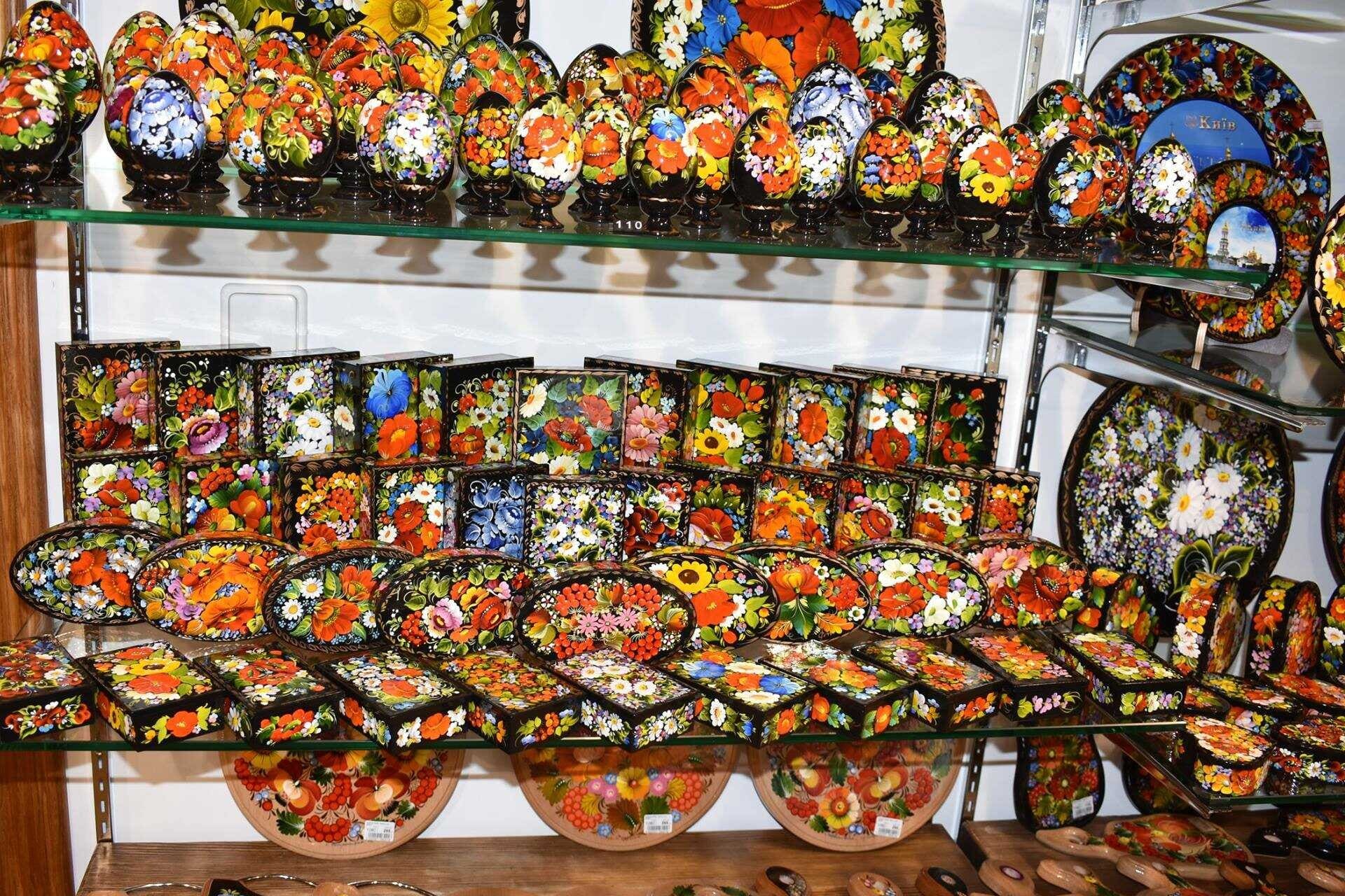 Ukrainian souvenirs with Petrykivka painting displayed in a shop in Kyiv