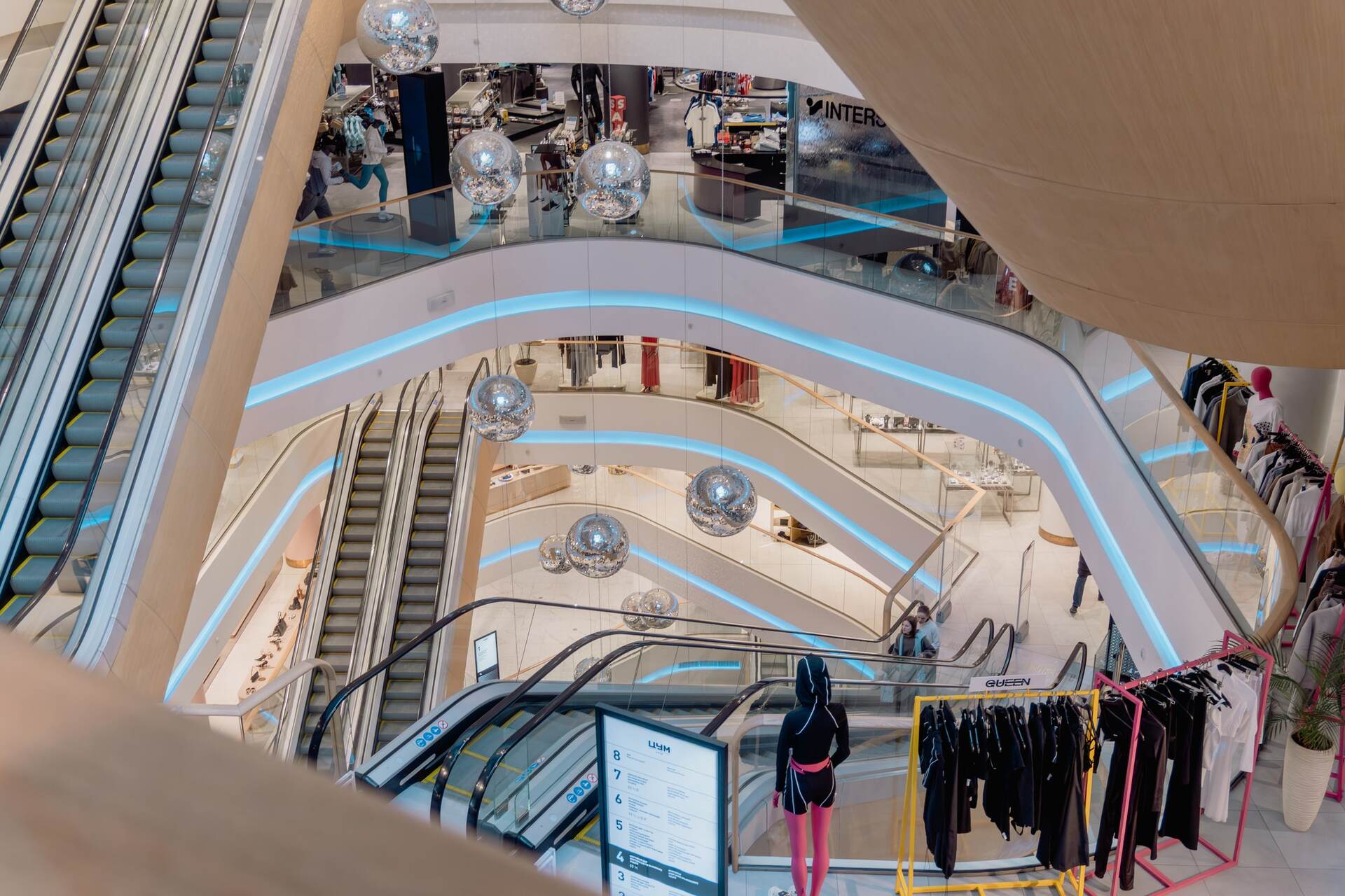 Multi-level interior of TSUM showing escalators and shopping floors in Kyiv