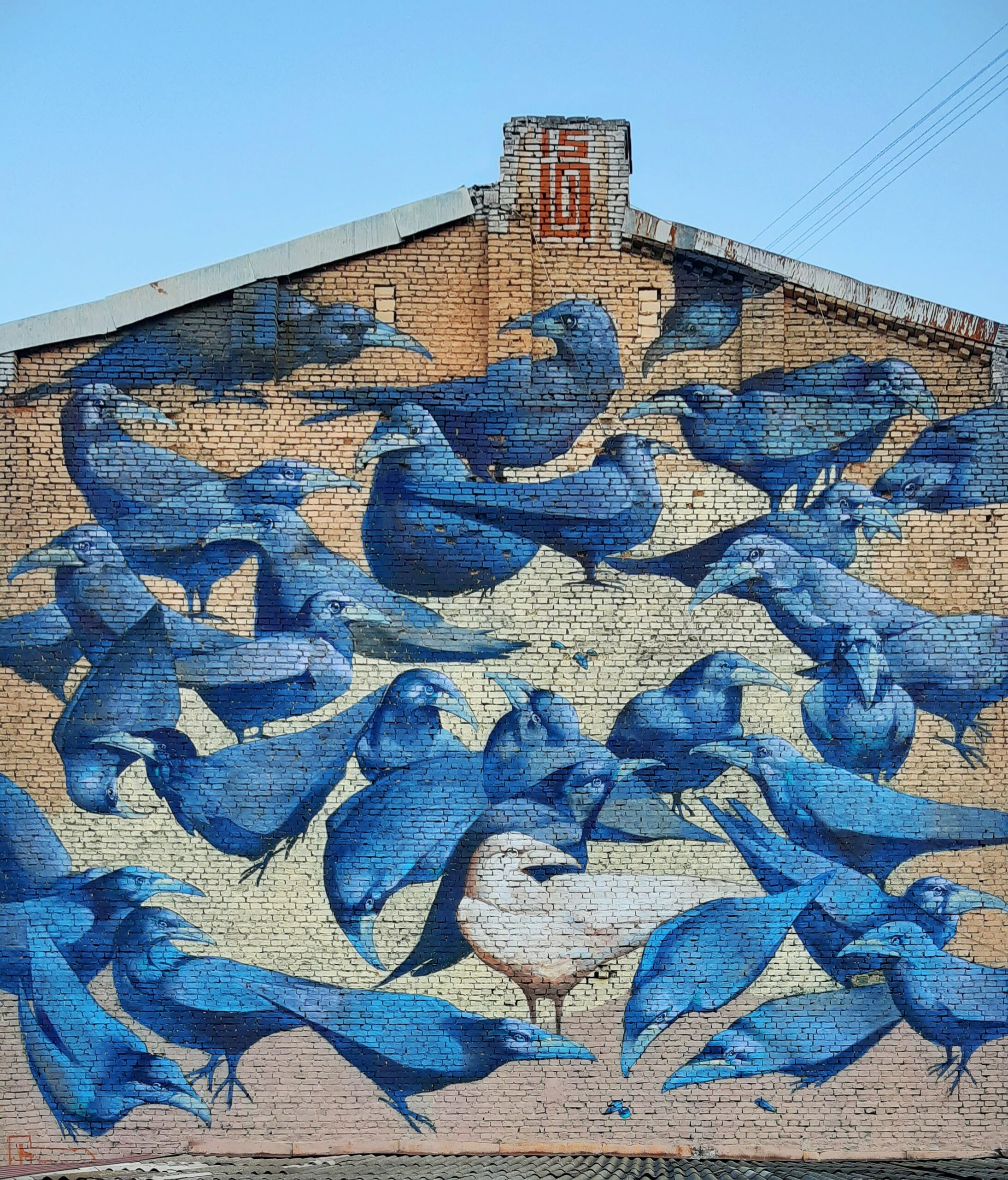 Messenger of Life in Kyiv - mural depicting a white crow symbolizing bright life amidst darkness