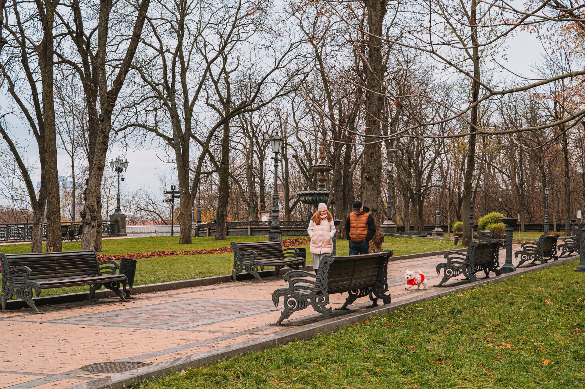 Volodymyrska Hill in Kyiv - people walking in the park