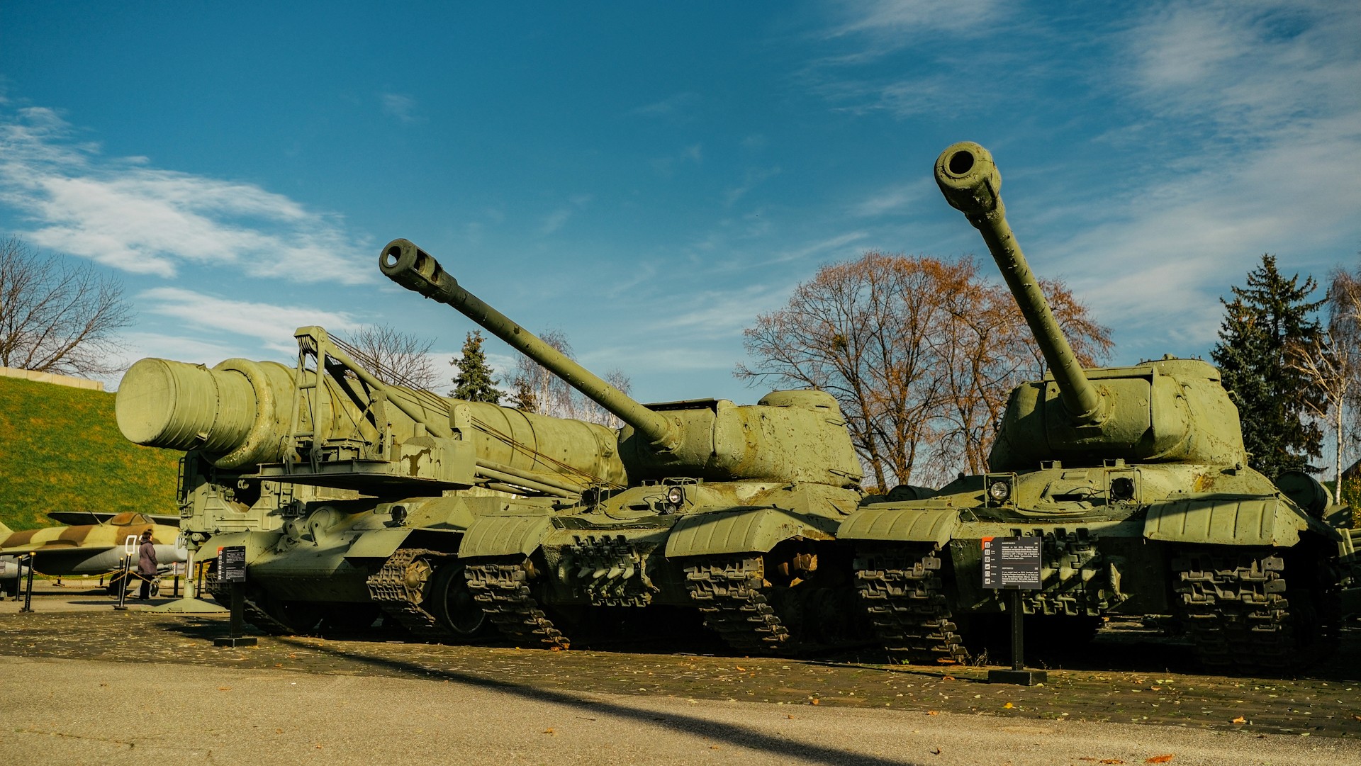 War Museum in Kyiv - outdoor display of vintage heavy military equipment including a large self-propelled gun and tanks