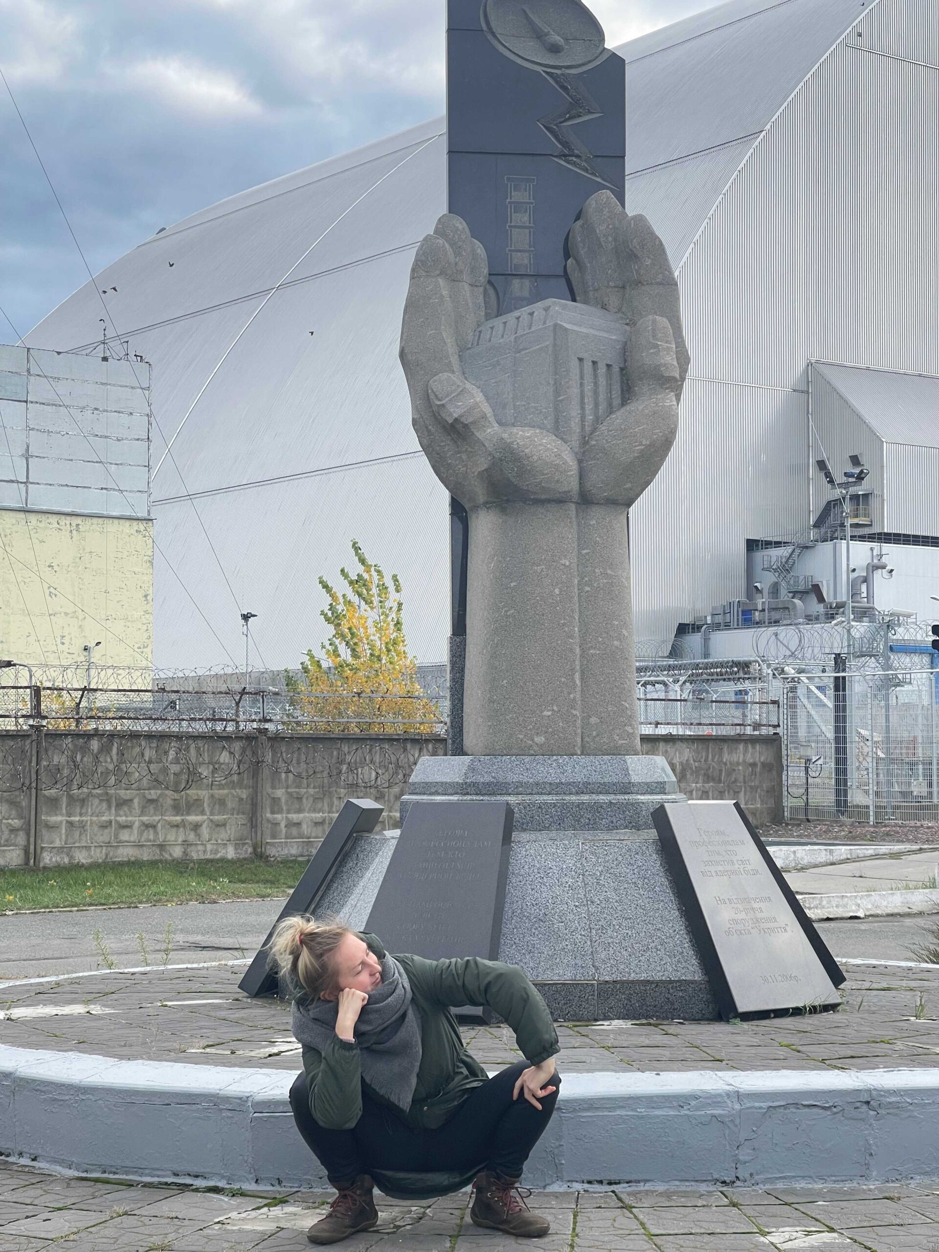 Visitor at Chornobyl memorial during first trip to Kyiv