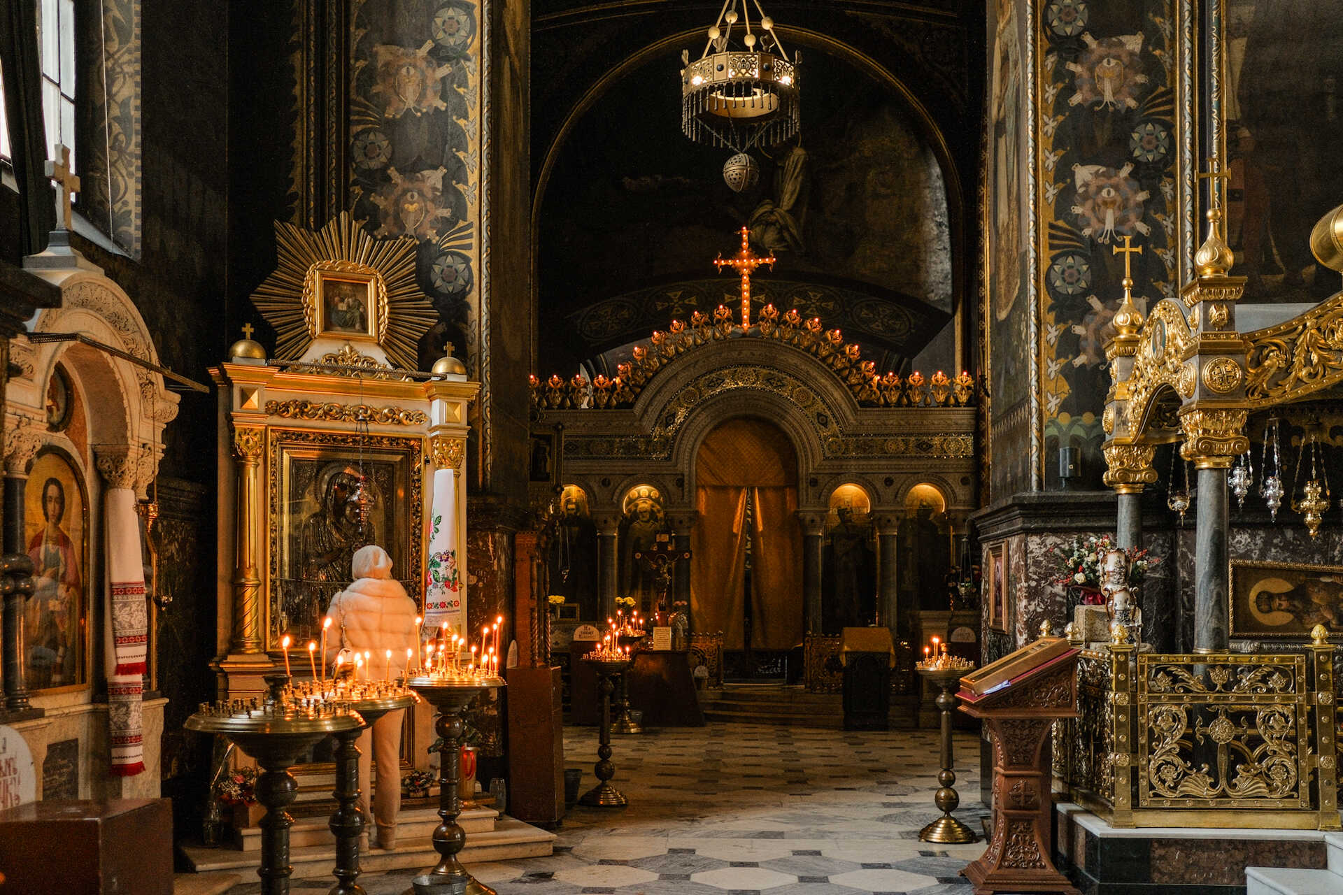 Altar and prayer candles in St. Volodymyr's Cathedral in Kyiv