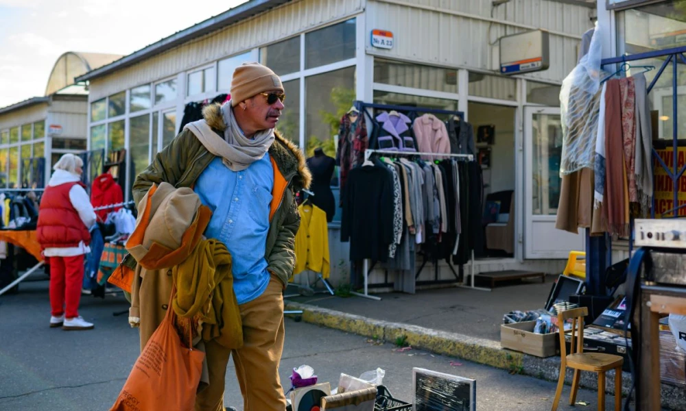 Looking at things at a street flea market near Pochaina station in Kyiv