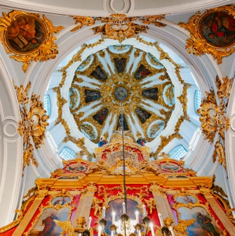 St. Andrew's Church in Kyiv - upward view of church dome and red iconostasis