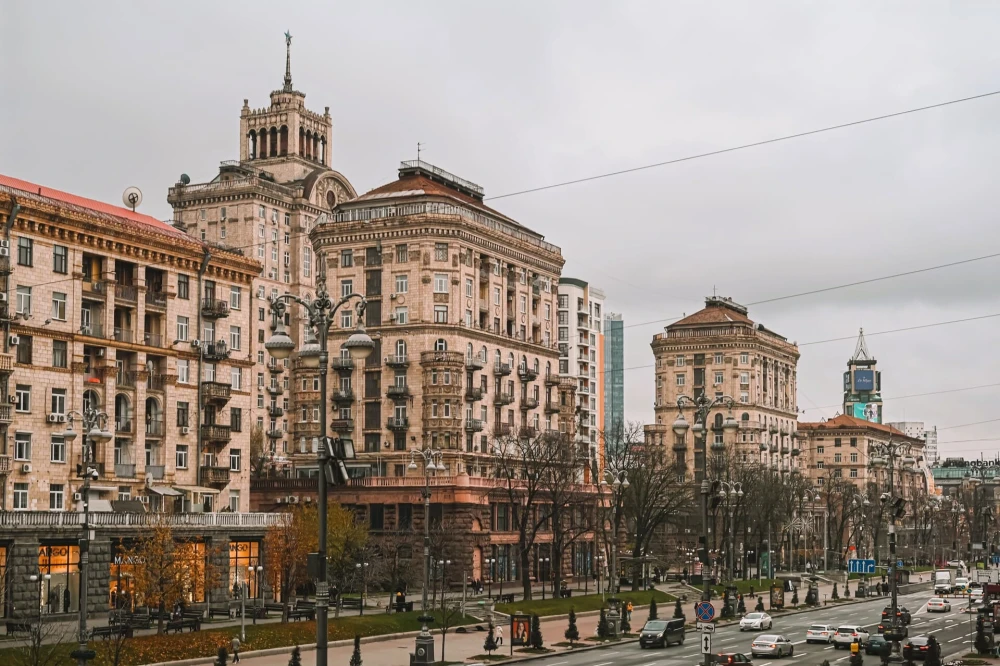 Khreshchatyk in Kyiv - historic brick skycraper on Khreshchatyk with a tall spire