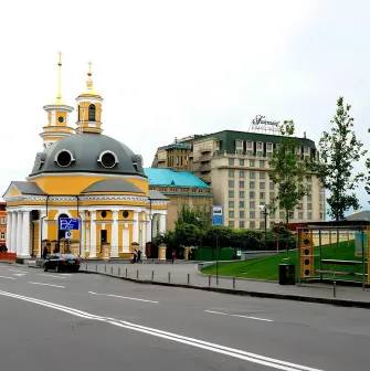 Poshtova Square in Kyiv - yellow Church of the Nativity of Christ and Fairmont Hotel