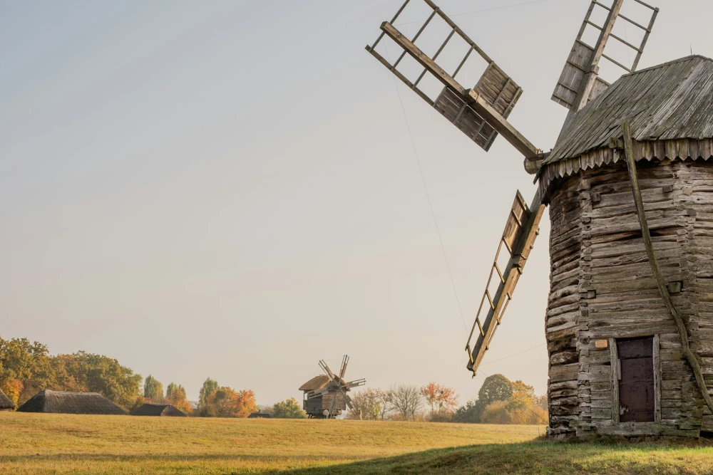 Pyrohiv Museum in Kyiv - historic wooden windmill in open field