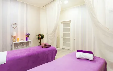 Spa Sense spa salon: bright room interior with purple tables