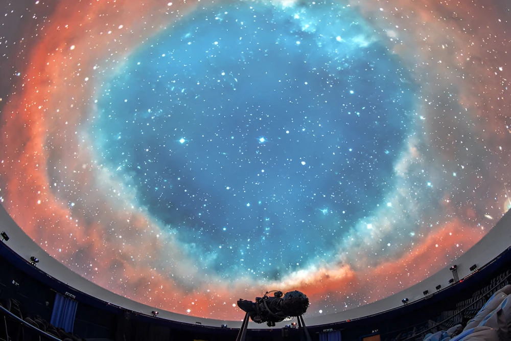 Panoramic projection of space and a galaxy on the dome of the Kyiv Planetarium