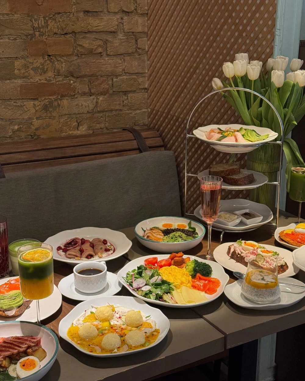 Gourmet presentation of main courses at Budynok Dyva restaurant in Kyiv