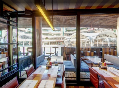 The Burger - wide dining area offering a stunning panoramic view through the large windows