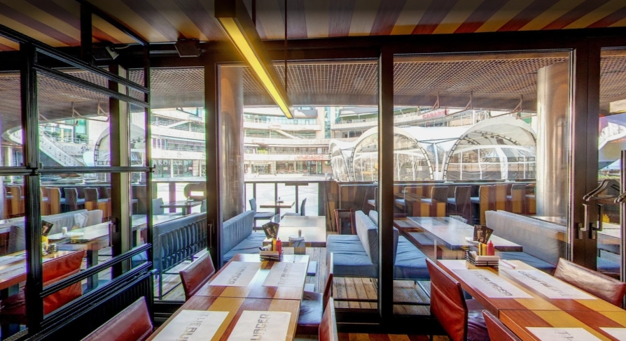 The Burger - wide dining area offering a stunning panoramic view through the large windows