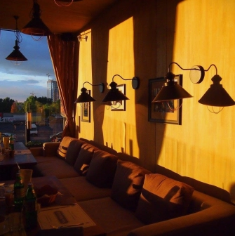 Restaurant Very Well Cafe - interior dining area offering a wide panoramic view through large windows