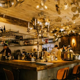 Fish Pussycat - large bar counter with a display of fresh seafood on ice