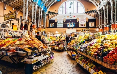 Colorful counters with fruits and vegetables in the historic interior of the Bessarabian market