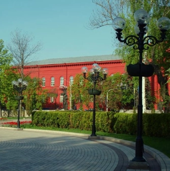 A wrought iron lantern and green area near Shevchenko University in Kyiv