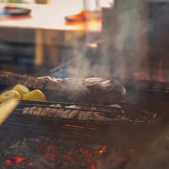 Mayak - steak and vegetables grilling over open fire