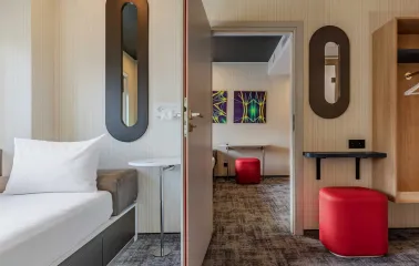 IQ Hotel - minimalist interior featuring bright lights and modern design