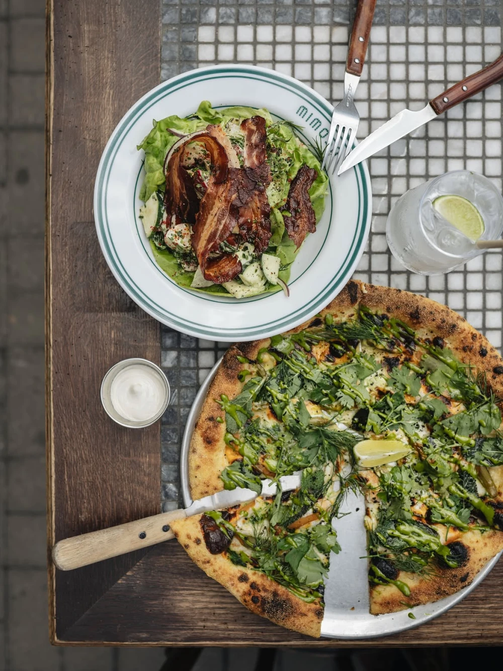Pizza with greens and salad with bacon at Mimosa Brooklyn Pizza