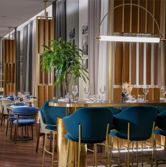 Radisson Blu - stylish, spacious hotel restaurant dining area ready for service