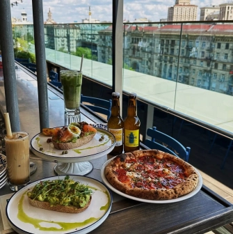 Milk Bar TSUM - close-up of a delicious dessert plate with cake and berries