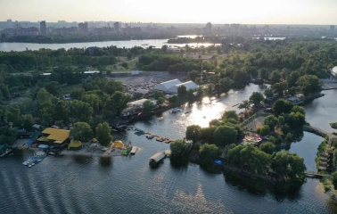 X-Park in Kyiv - aerial panoramic view of the green islands, river channels and sports zones