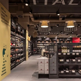 Goodwine in Kyiv - large aisles of a wine store with wines from different countries