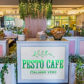 Pesto Cafe - welcoming reception area with comfortable seating and stylish decor
