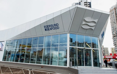 Egersund - storefront facade with signage and large glass windows